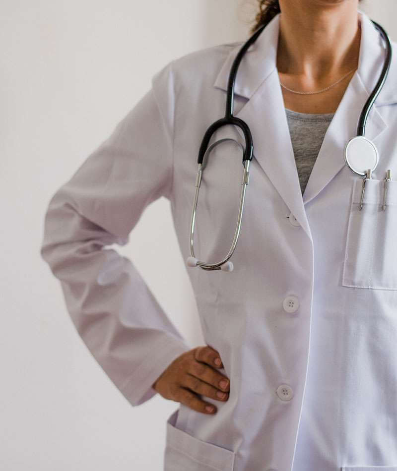 doctor with hand on hip